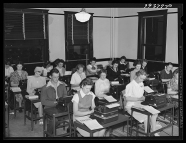 Typing class at the San Diego Vocational School, June 1941. Photo by Lee Russell, courtesy U.S. Farm Security Administration/Office of War Information/Office of Emergency Management/Resettlement Administration Black & White Photographs, Library of Congress Prints and Photographs Division Washington, D.C. http://www.loc.gov/pictures/item/2017789625/